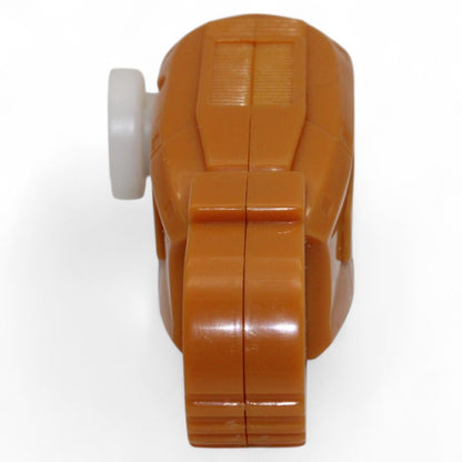 Close-up of the orange plastic Unicron Armada thigh replacement part