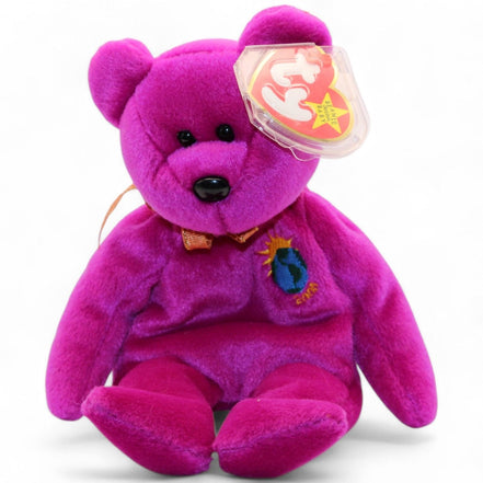 Ty Beanie Baby Millennium Bear 1999 with purple plush and tag