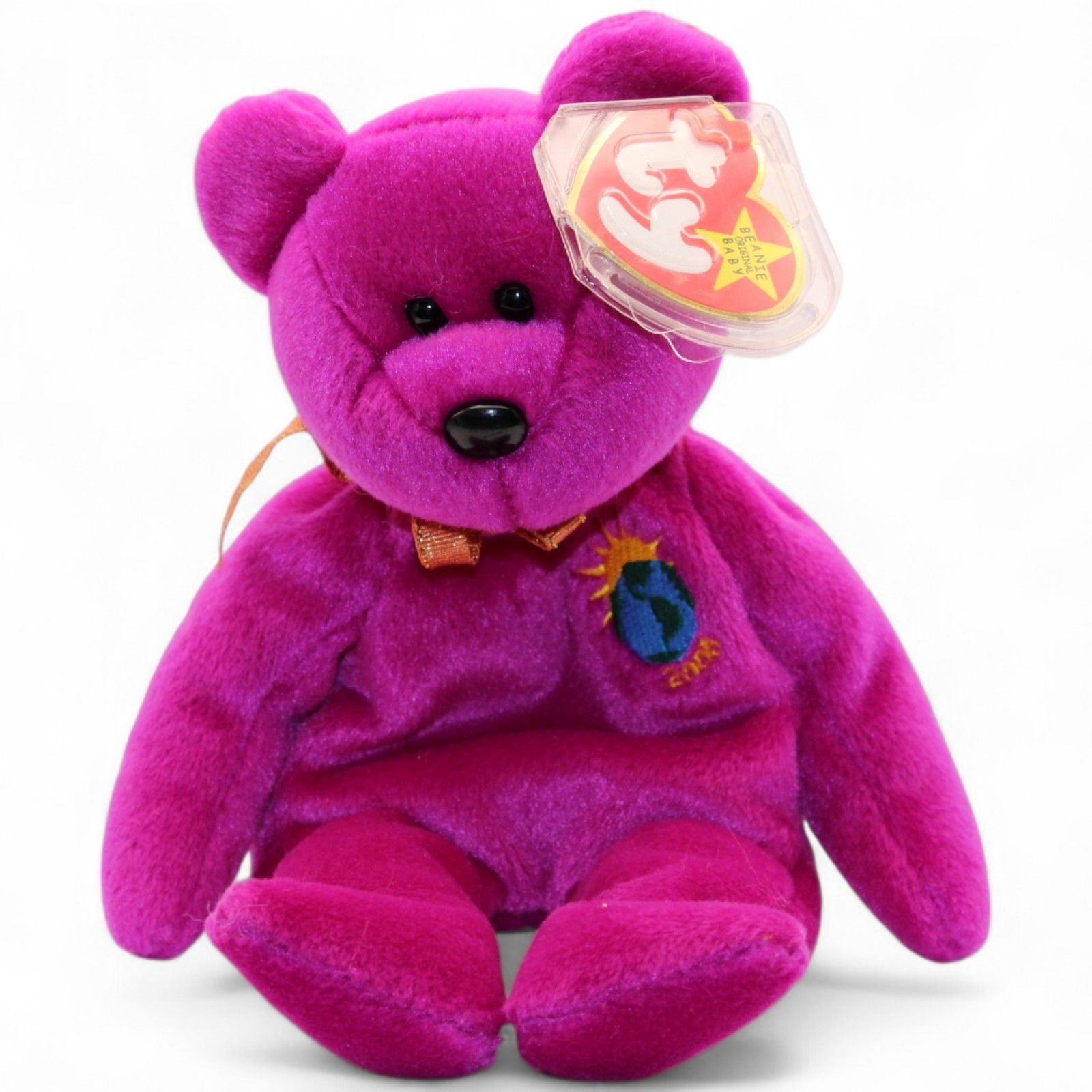 Side view of Ty Beanie Baby Millennium Bear 1999 with Earth embroidery