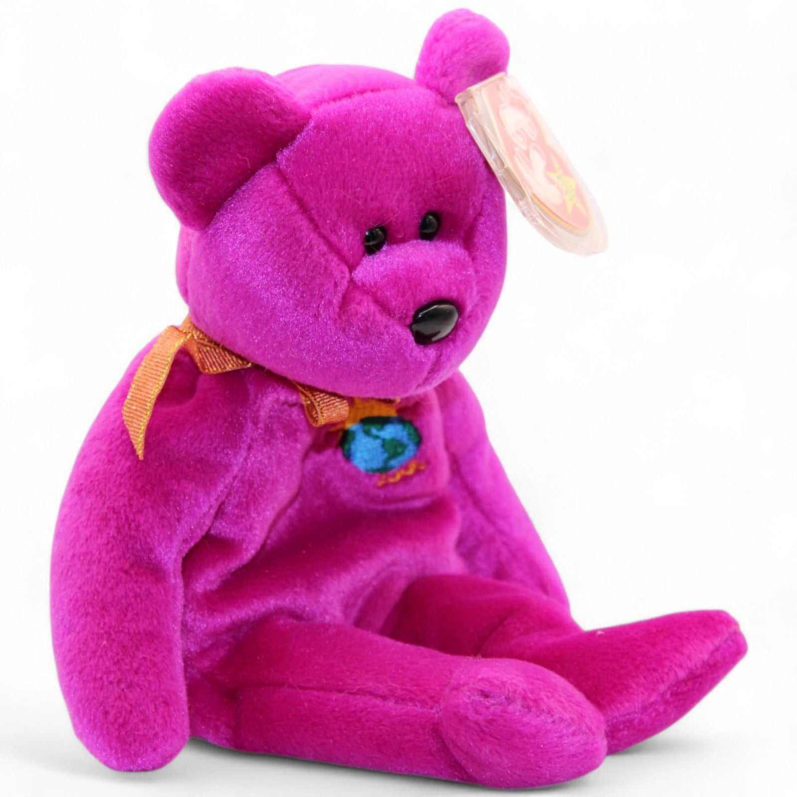 Back view of Ty Beanie Baby Millennium Bear 1999 showing gold ribbon