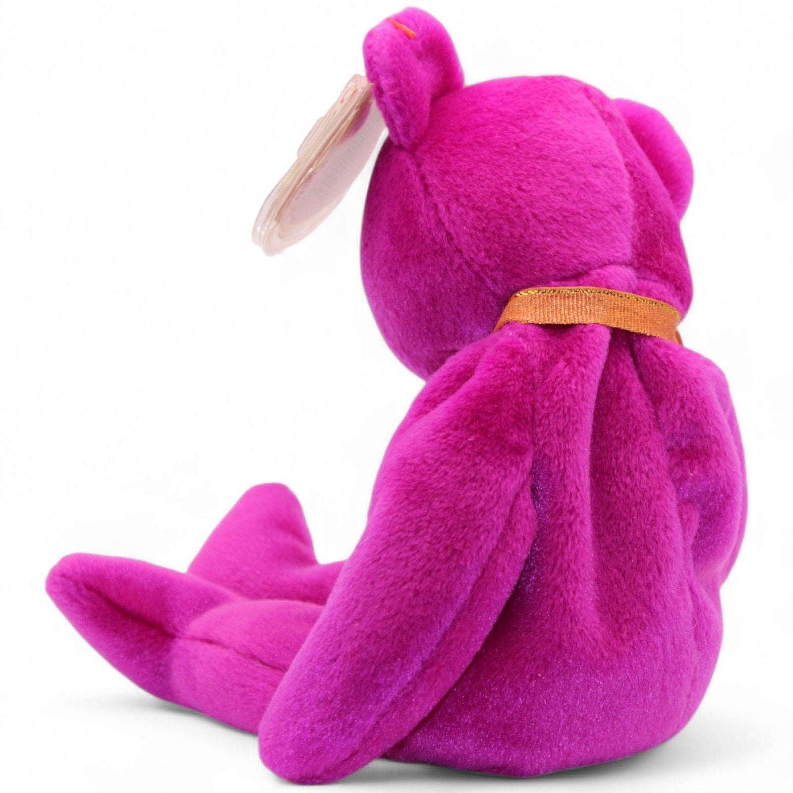 Ty Beanie Baby Millennium Bear 1999 with purple plush and tag