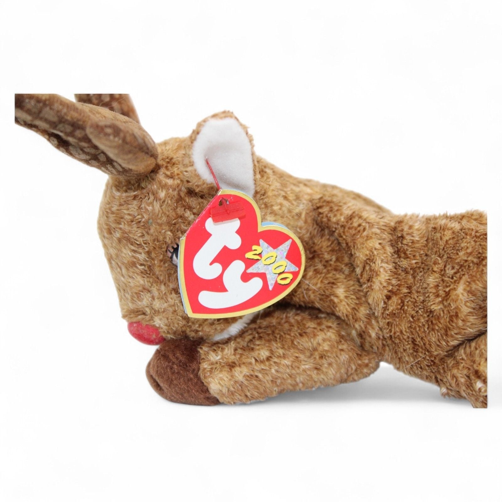 Close-up of Ty Beanie Baby Roxie The Reindeer plush toy's face and tags