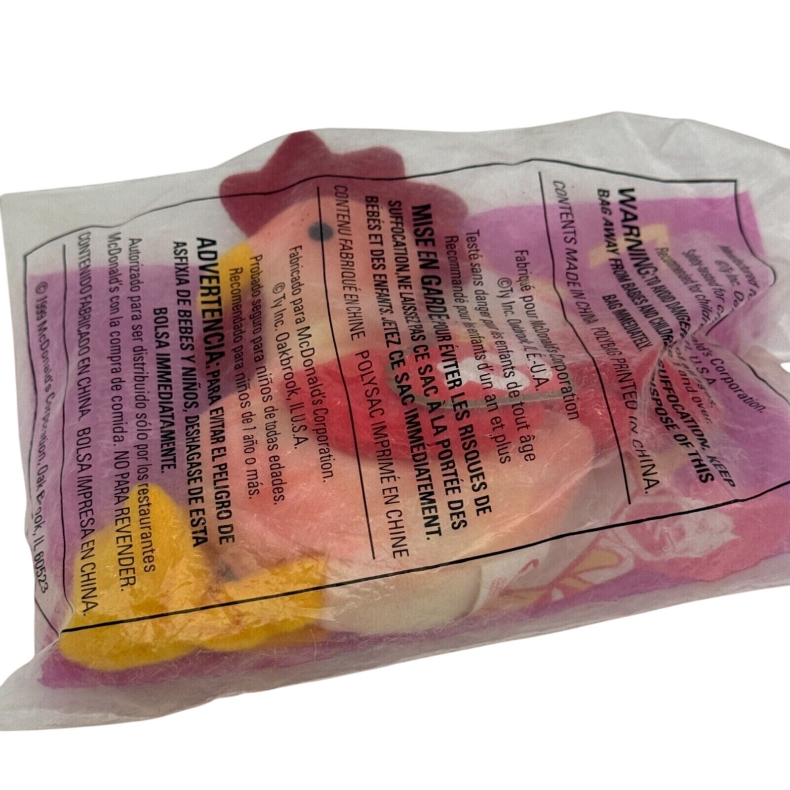 Back view of the sealed Ty Beanie Baby Strut the Rooster package showing details