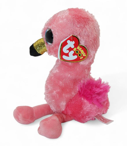 Side view of Gilda the flamingo plush showing Ty tag