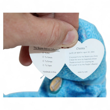 Ty Classy Beanie Baby Bear plush with blue swirl pattern and ribbon