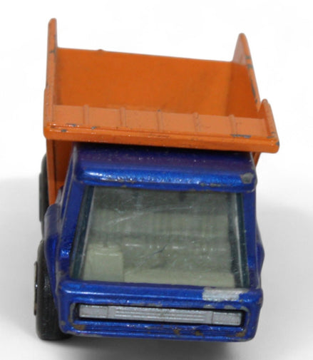 Side view of the vintage Lesney Matchbox Atlas Dump Truck showing its tilt bed
