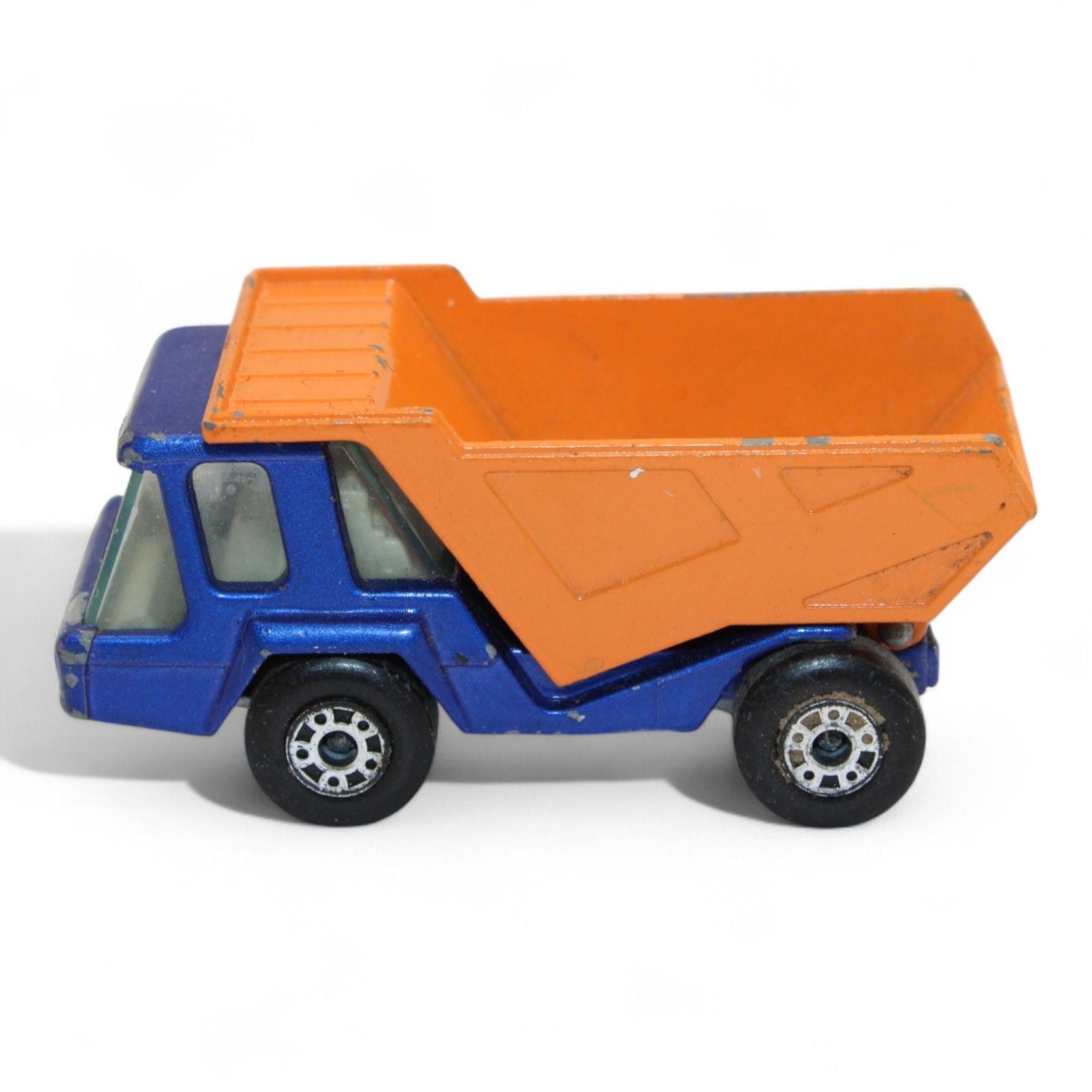 Vintage 1975 Lesney Matchbox Atlas Dump Truck in blue and orange with superfast wheels
