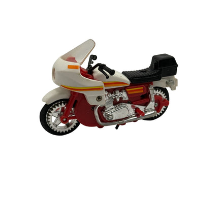 Vintage 1980s LJN Rough Riders 2X2 dirt bike toy in red and white with chrome accents
