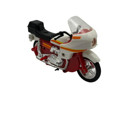 Side view of vintage LJN Rough Riders 2X2 dirt bike toy with detailed chrome features