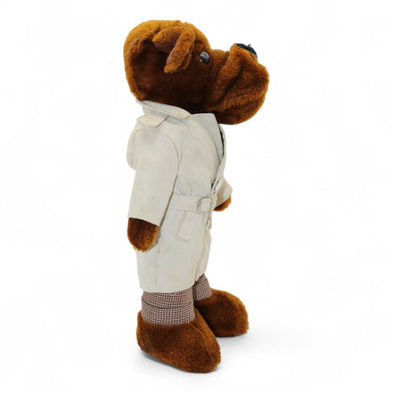 Another side view of McGruff plush with check pants