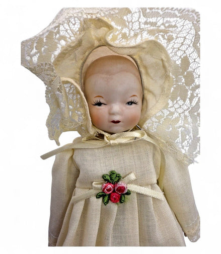 Close-up of Schmid Happyland doll's face and lace bonnet