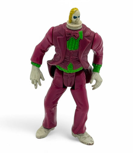 Vintage 1989 Kenner Spinhead Beetlejuice action figure with striped suit and green hair