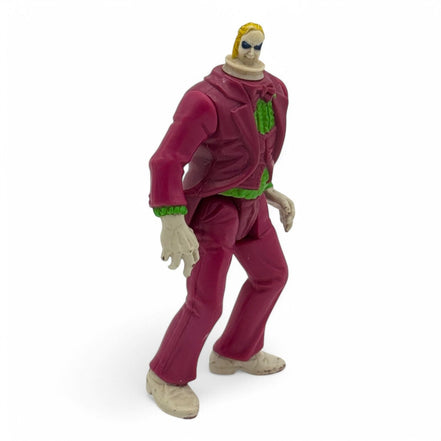 Vintage 1989 Kenner Spinhead Beetlejuice action figure with striped suit and green hair