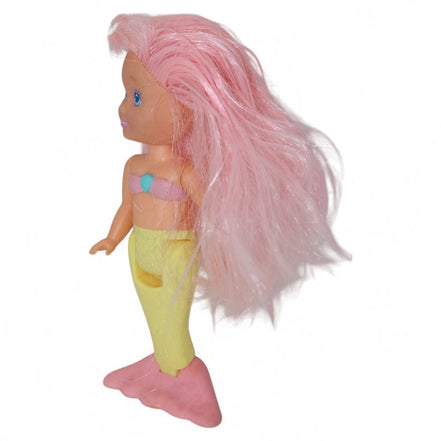 Side view of vintage Playskool mermaid doll with pastel colors