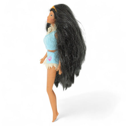 Side view of vintage Pocahontas Barbie Doll with long hair
