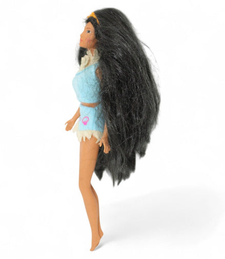 Side view of vintage Pocahontas Barbie Doll with long hair