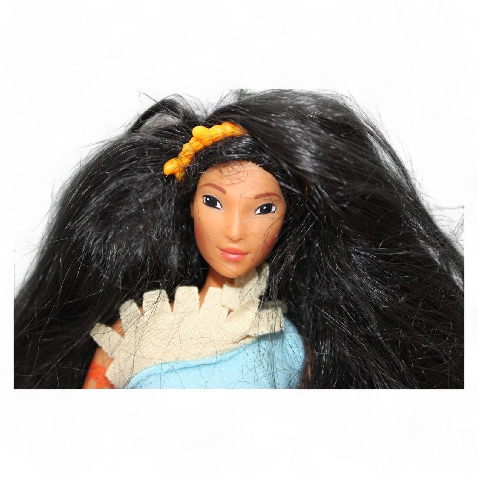 Close-up of Pocahontas Barbie Doll's face and hair