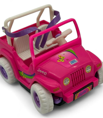 Vintage Barbie Kelly Jeep toy car with floral decals and pink color