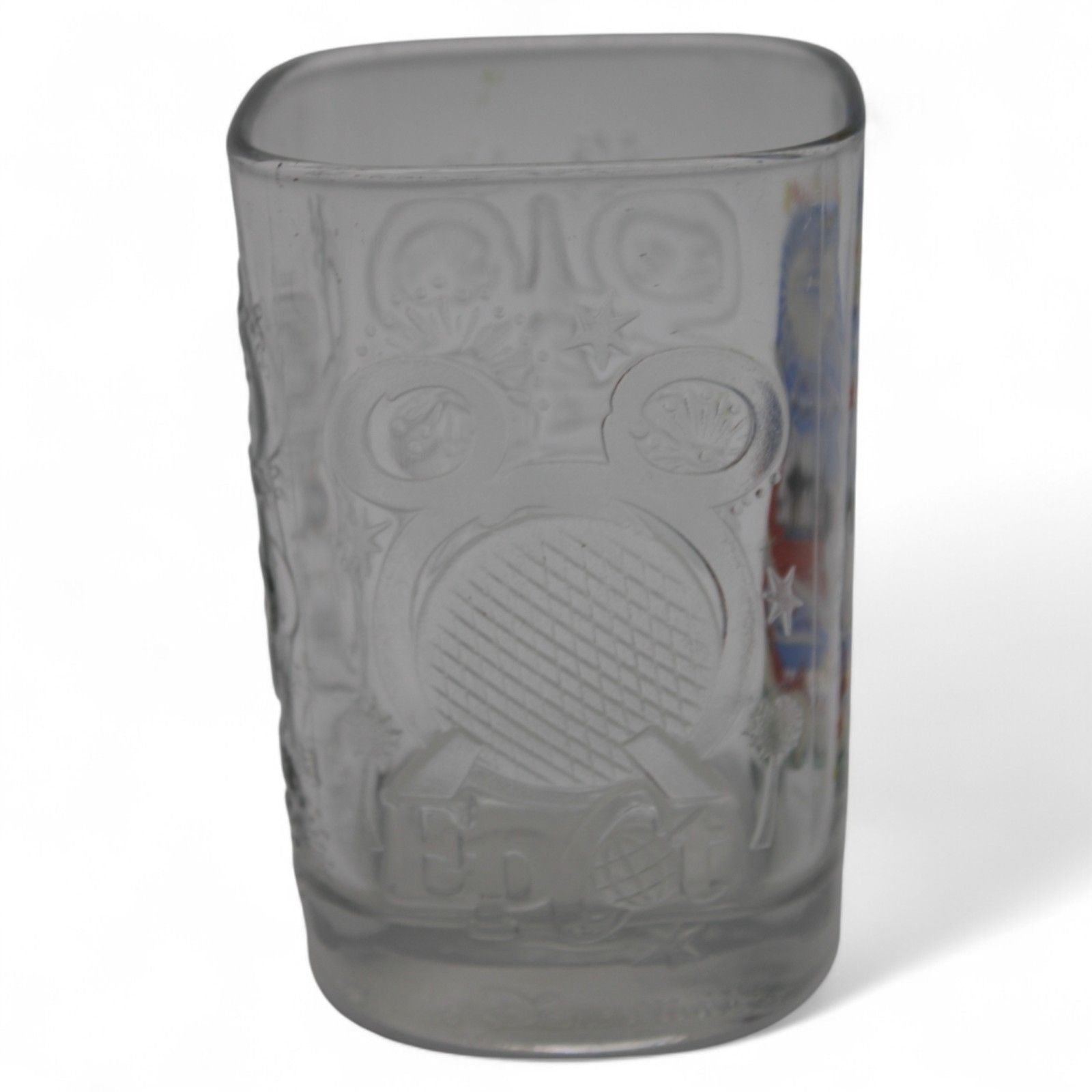 Embossed Disney landmarks on vintage 2000 collector glass