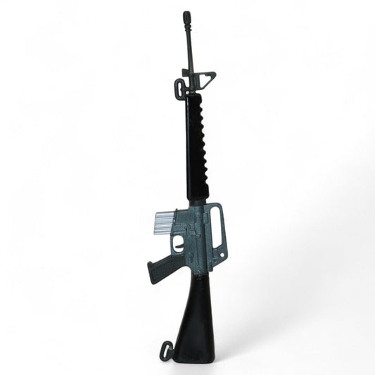 Vintage G.I. Joe 12-inch action figure rifle accessory standing upright
