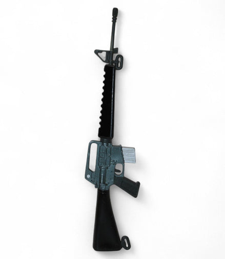 Side view of vintage G.I. Joe 12-inch action figure rifle accessory
