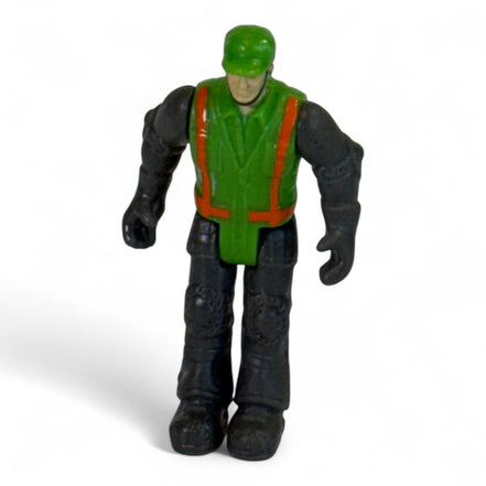 Vintage green and black toy soldier action figure standing upright