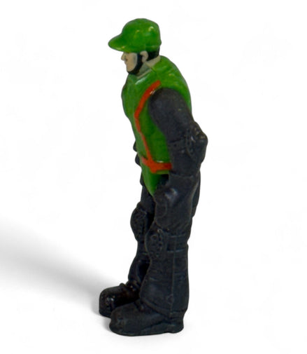 Side view of vintage green and black toy soldier action figure