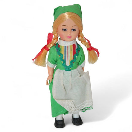 Vintage Irish doll in green dress with blonde braids and lace apron