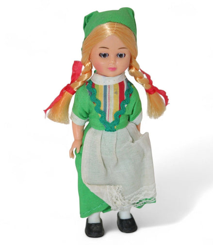 Vintage Irish doll in green dress with blonde braids and lace apron