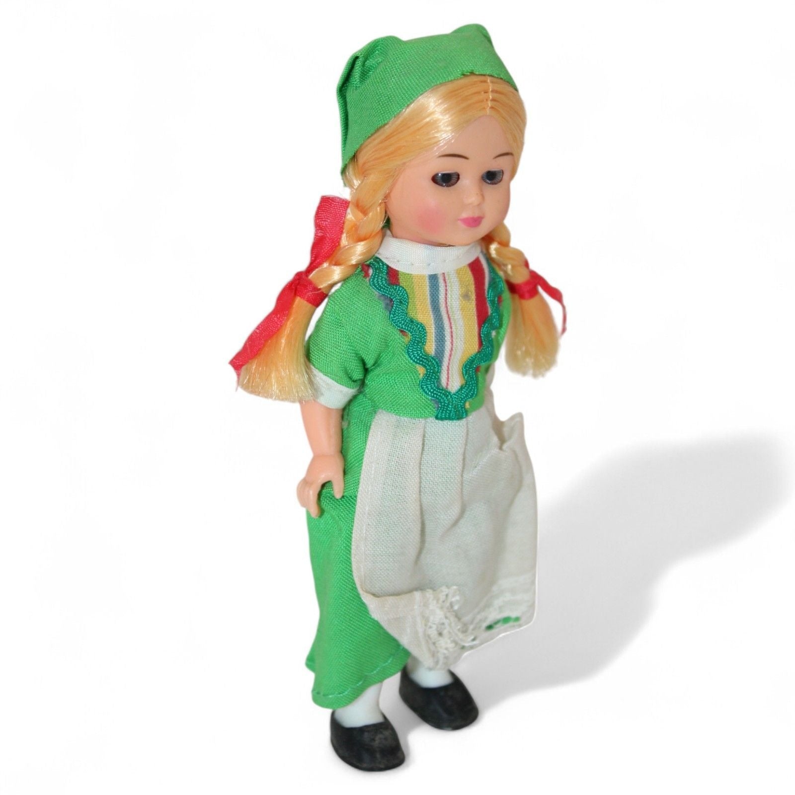 Close-up of Irish doll's shoes and green dress