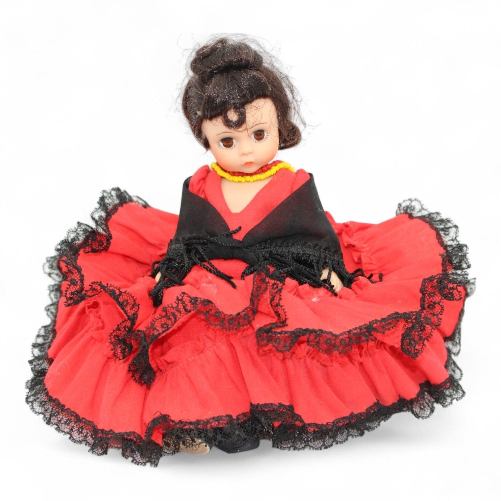 Close-up of Vintage Madame Alexander Doll's face and dress