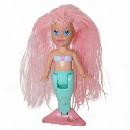 Vintage mermaid doll with pink hair and glittery tail