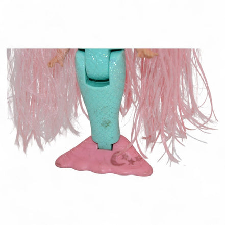 Close-up of vintage mermaid doll's glittery tail