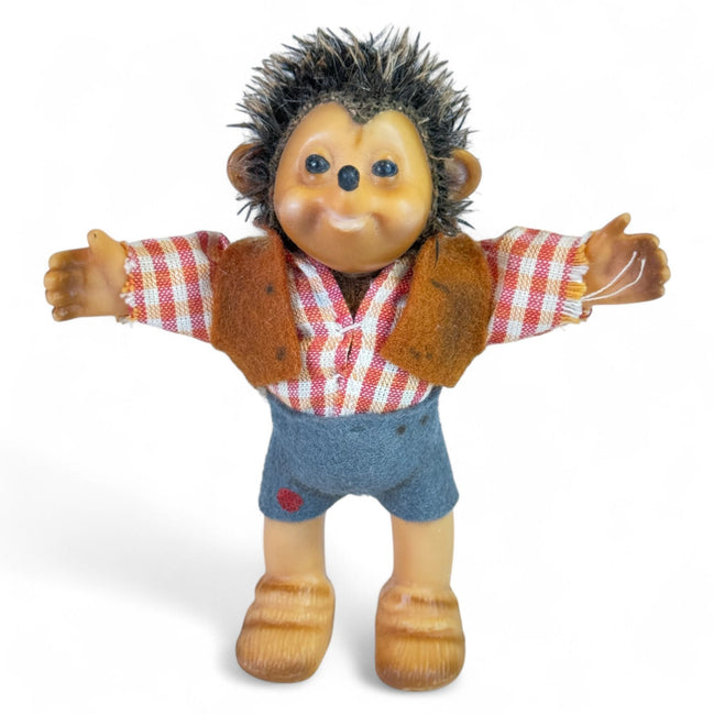 Vintage Steiff hedgehog rubber toy with plaid outfit