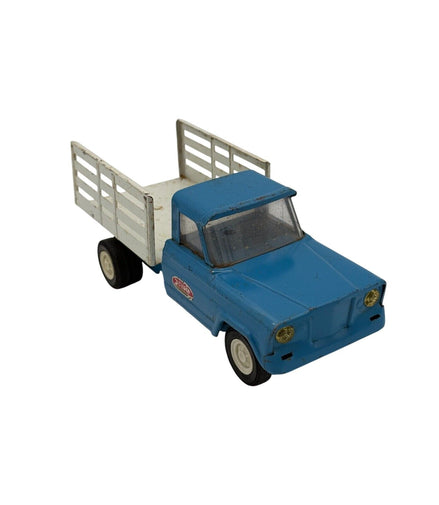 Vintage Tonka blue stake truck with white bed from the 1960s