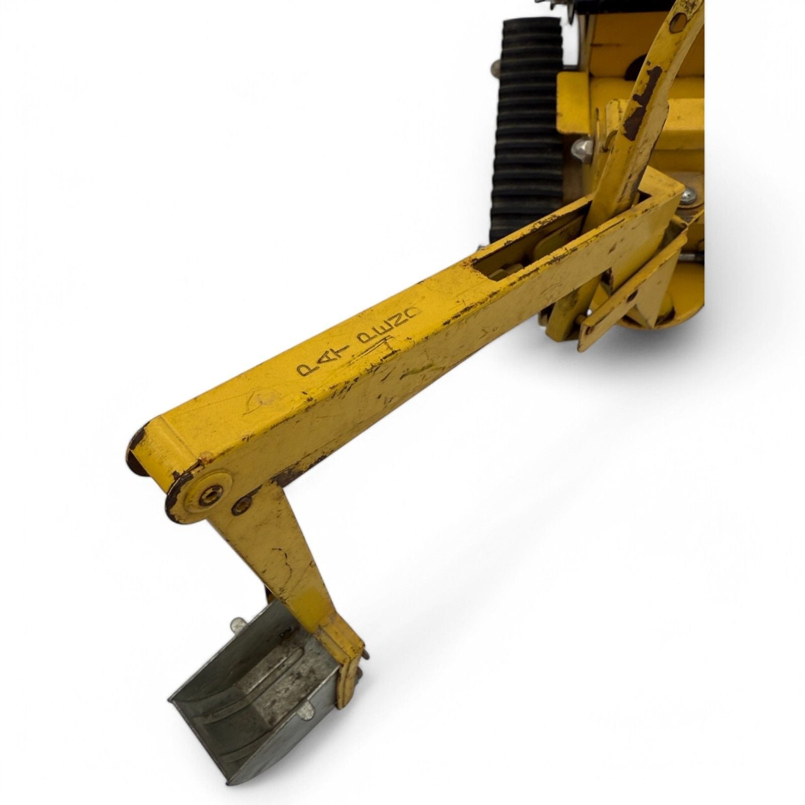 Vintage Tonka Trencher diecast metal excavator toy with yellow and black details