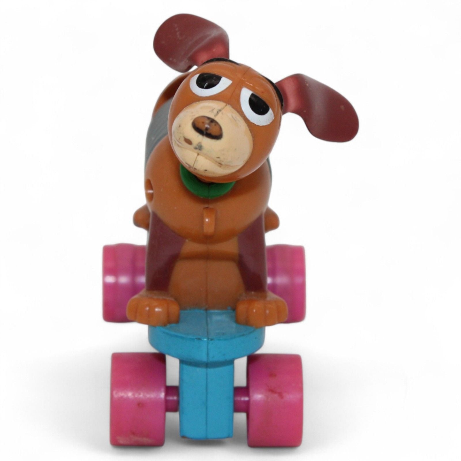 Front view of Slinky Dog toy with pink wheels