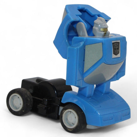 Front view of vintage Transformers G1 Freeway 1985 blue mini Autobot robot
