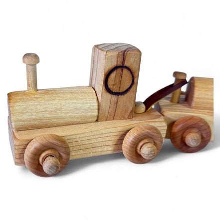 Close-up of the handcrafted wooden train engine
