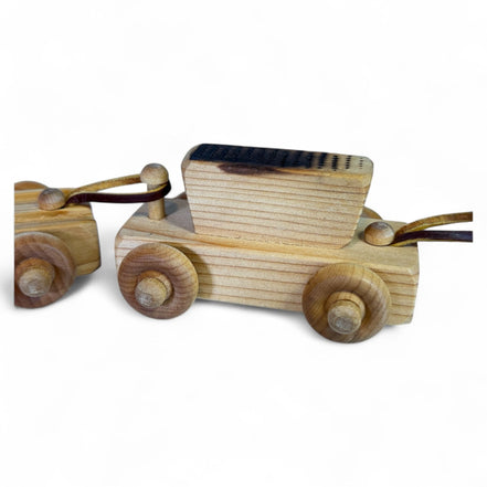Wooden toy train car with natural wood texture