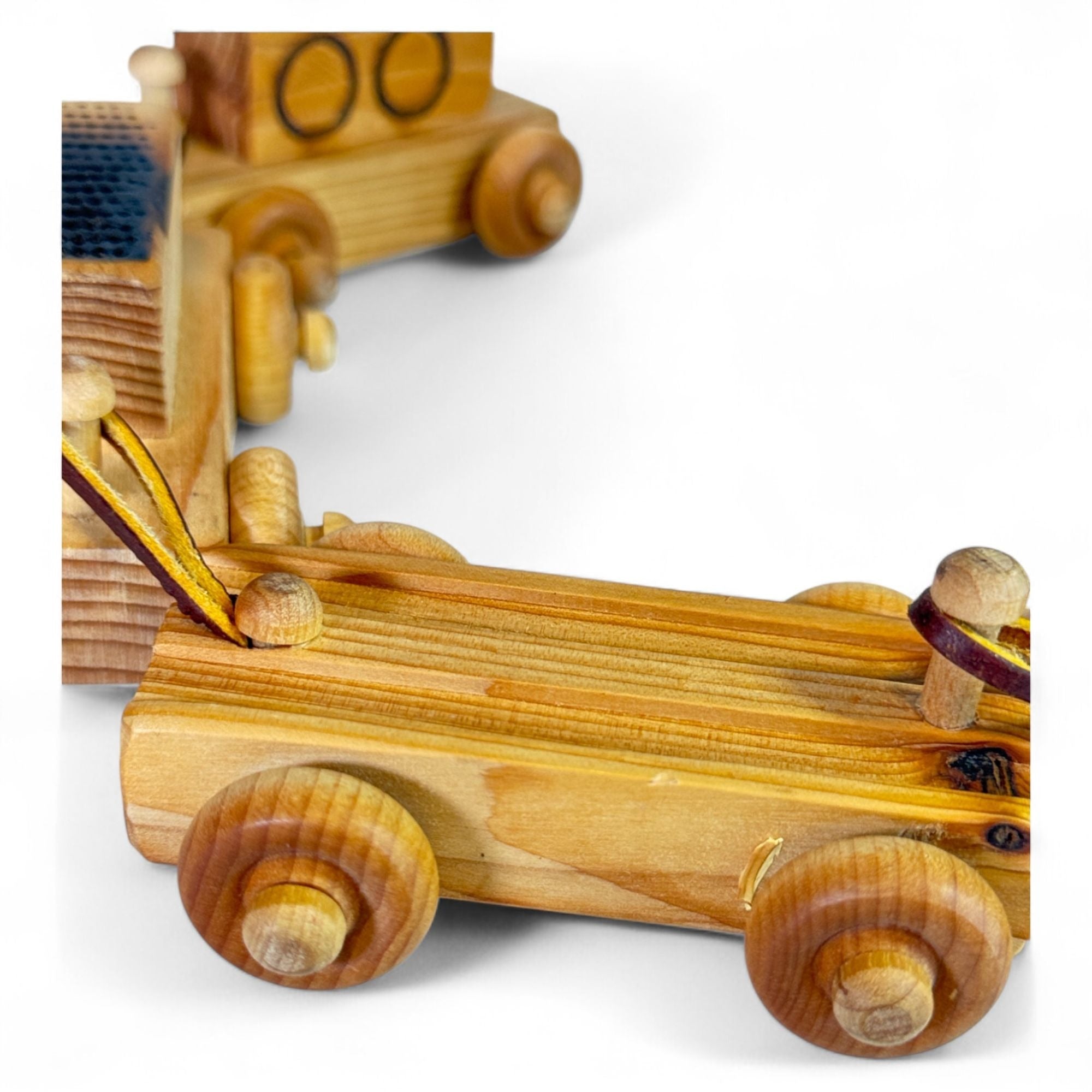 Detailed view of the wooden train car's top design