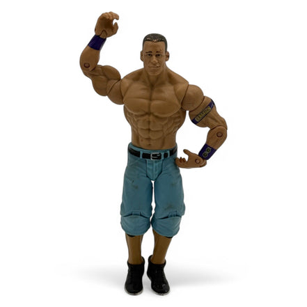 WWE John Cena action figure in blue pants and black shoes, front view
