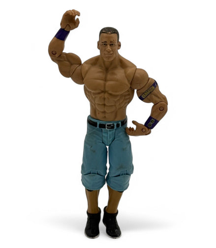 WWE John Cena action figure in blue pants and black shoes, front view