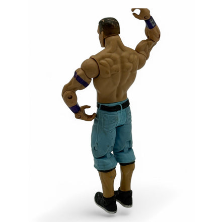 WWE John Cena action figure in blue pants, side angle